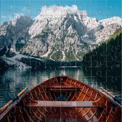 Wooden Boat in the Middle of a Mountain Lake Jigsaw Puzzle