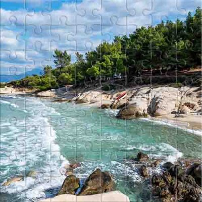 Rocky Coastline Under Summer Sky Jigsaw Puzzle