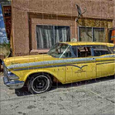 Taxi viejo cerca del garaje Rompecabezas