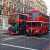 Two Red Buses on a London Street Jigsaw Puzzle