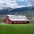 La ferme rouge au pied des montagnes Puzzle