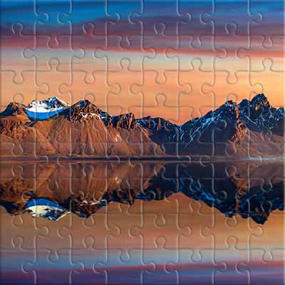 Spiegelung der Berge bei Sonnenuntergang